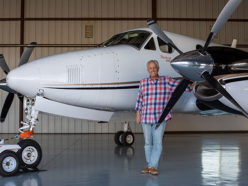 Chuck with King Air in Hangar